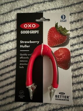 OXO Good Grips Strawberry Huller in bright pink-red